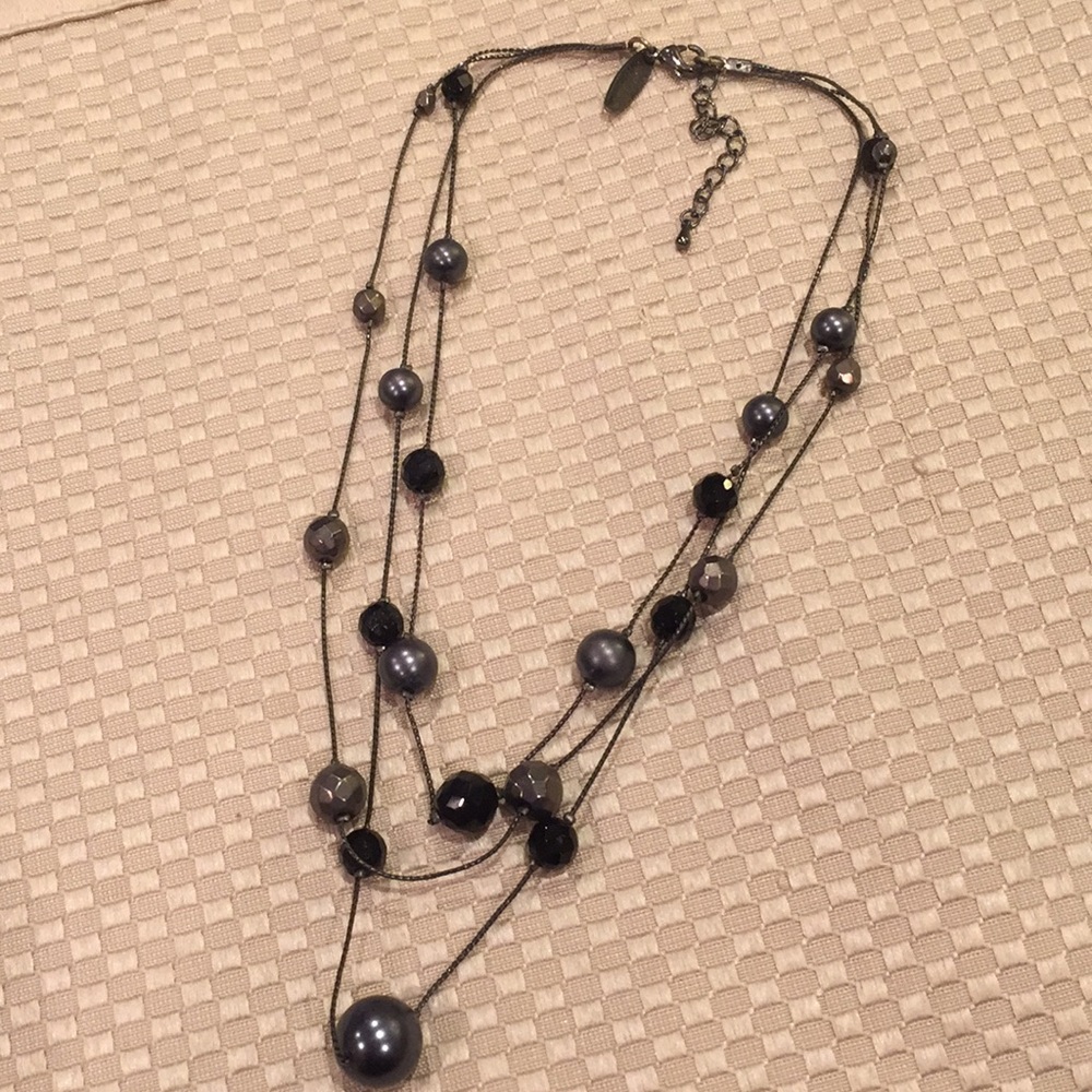 Black beaded necklace layered from NY &Co.